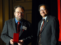 HOH_Arnow-medallion.jpg tom arnow accepts medallion for mother